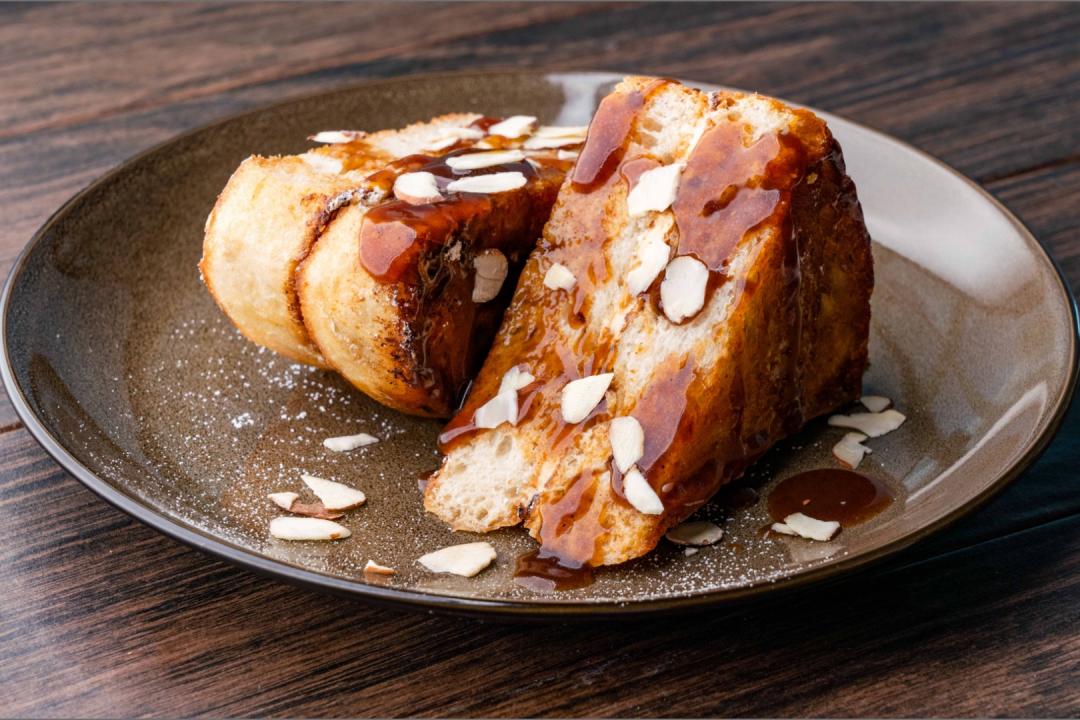 Zesty Orange drenched French Toast on a plate